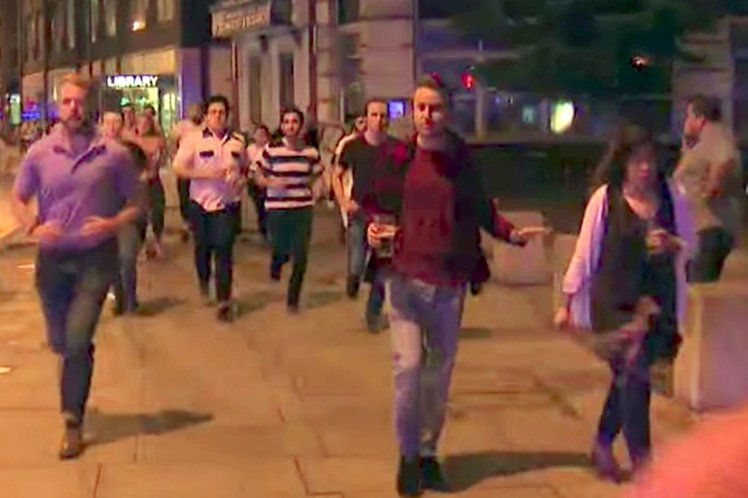 Man Drinking Pint Photographed While Fleeing Terror Attack